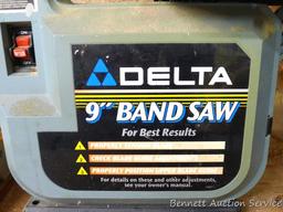 Delta 9" band saw comes with 5 extra blades. Runs, and is model No 28-150. Measures about 19" x 12"
