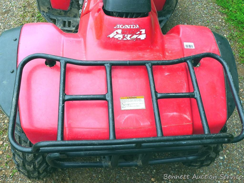 Honda Fourtrax 300 4x4 ATV starts, runs and drives well. Tires have good tread and minor checking.