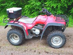 Honda Fourtrax 300 4x4 ATV starts, runs and drives well. Tires have good tread and minor checking.