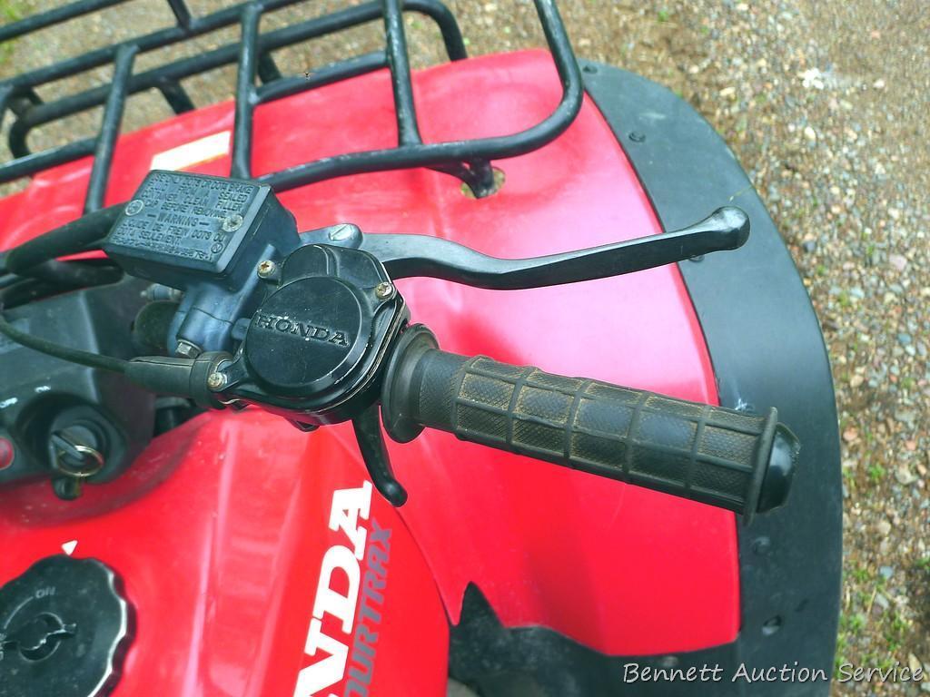 Honda Fourtrax 300 4x4 ATV starts, runs and drives well. Tires have good tread and minor checking.