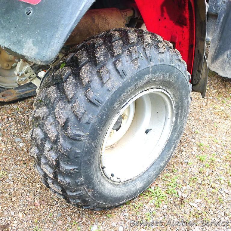 Honda Fourtrax 300 4x4 ATV starts, runs and drives well. Tires have good tread and minor checking.