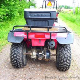 Honda Fourtrax 300 4x4 ATV starts, runs and drives well. Tires have good tread and minor checking.