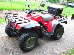 Honda Fourtrax 300 4x4 ATV starts, runs and drives well. Tires have good tread and minor checking.