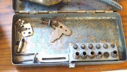 Whitney No. 4-B Metal hole punch is 8-1/4" long. Comes with metal case and several sizes of hole