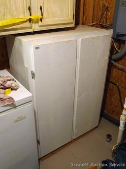 Storage cabinet could be wall mounted and is handy for garage, basement, etc. Measures approx. 51"