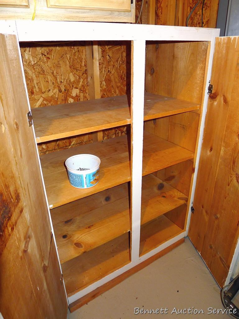 Storage cabinet could be wall mounted and is handy for garage, basement, etc. Measures approx. 51"