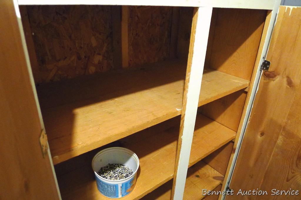 Storage cabinet could be wall mounted and is handy for garage, basement, etc. Measures approx. 51"