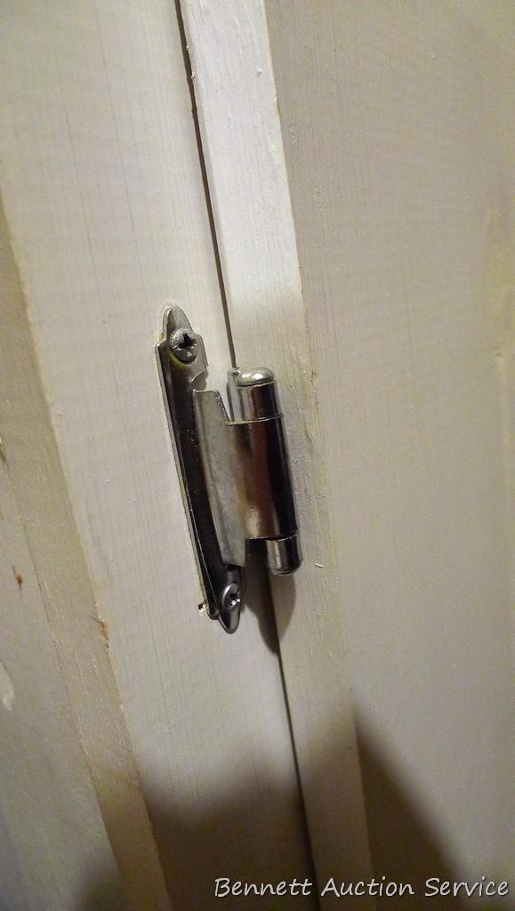 Storage cabinet could be wall mounted and is handy for garage, basement, etc. Measures approx. 51"