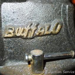 Buffalo No 4 swiveling bench vise is about 8" tall and 14" long when jaws are closed. Jaws look to