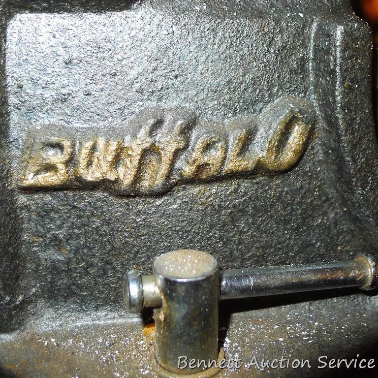 Buffalo No 4 swiveling bench vise is about 8" tall and 14" long when jaws are closed. Jaws look to
