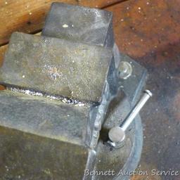 Buffalo No 4 swiveling bench vise is about 8" tall and 14" long when jaws are closed. Jaws look to