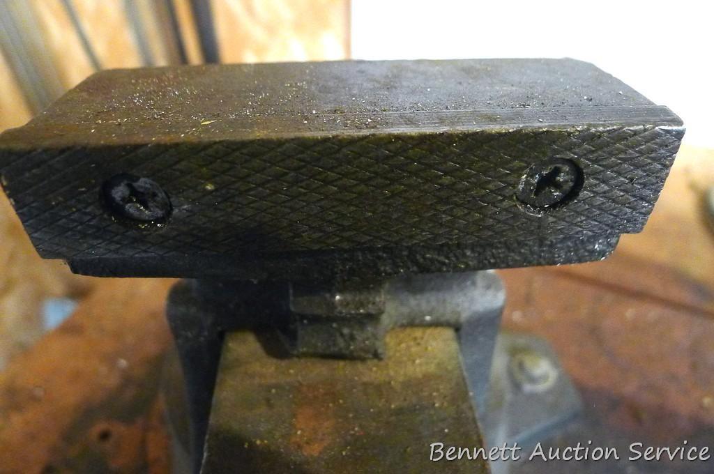Buffalo No 4 swiveling bench vise is about 8" tall and 14" long when jaws are closed. Jaws look to