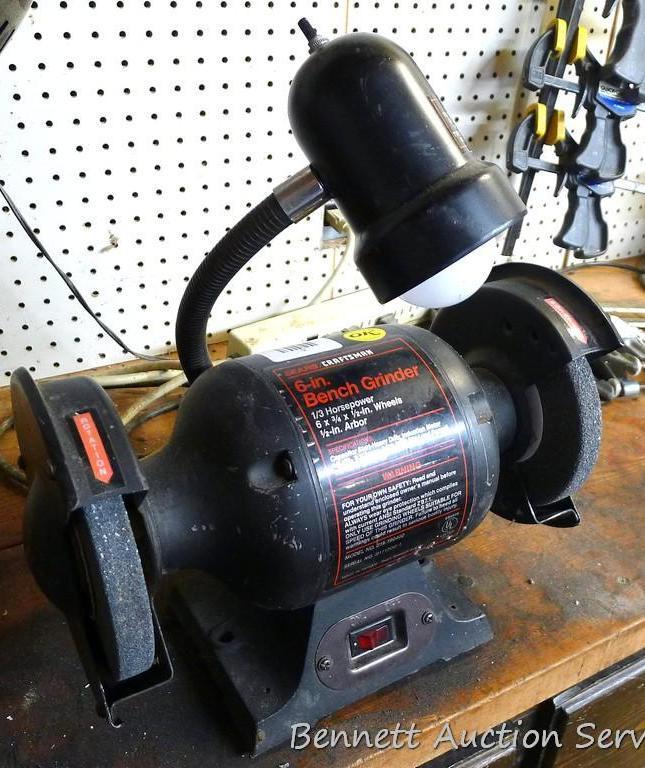 Sears/Craftsman 6 in bench grinder, runs. Grinder is 1/3 horsepower and has a 1/2" arbor. Also has