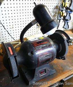 Sears/Craftsman 6 in bench grinder, runs. Grinder is 1/3 horsepower and has a 1/2" arbor. Also has