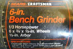 Sears/Craftsman 6 in bench grinder, runs. Grinder is 1/3 horsepower and has a 1/2" arbor. Also has