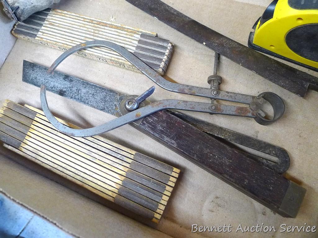 Strait -Line laser level, draw shave, folding measuring sticks, more. Draw shave is about 16" x 6".