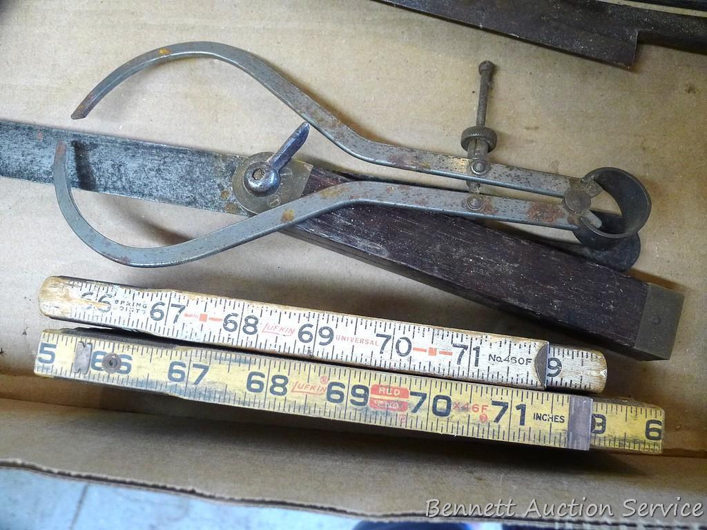 Strait -Line laser level, draw shave, folding measuring sticks, more. Draw shave is about 16" x 6".