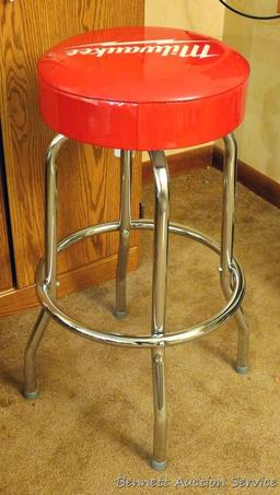 Milwaukee shop stool looks near new; pair of Craftsman pint glasses with tin coasters is NIB.