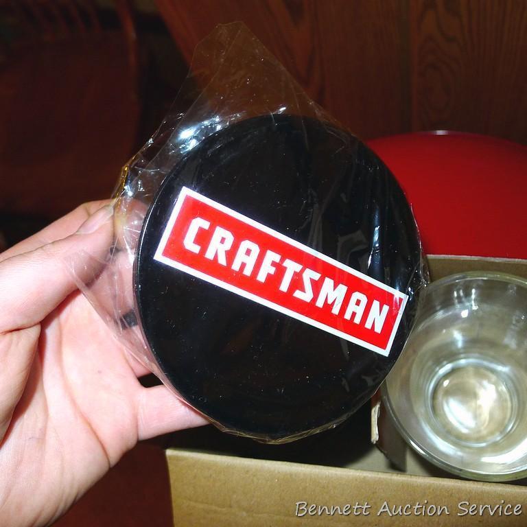 Milwaukee shop stool looks near new; pair of Craftsman pint glasses with tin coasters is NIB.