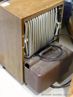 Crosley 40 pint frost free automatic dehumidifier, powers up. Cabinet measures 23" high x 13" x 12".