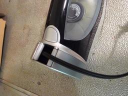 Hamilton Beach iron has retractable cord. Heats up, model No 14210.