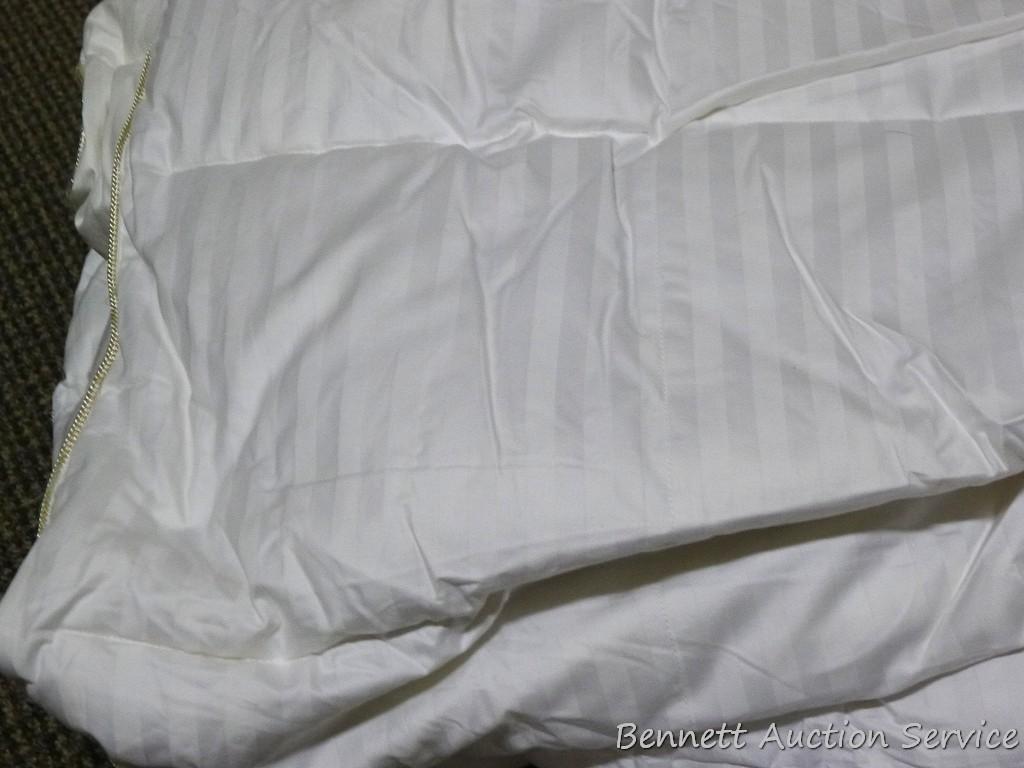 Twin size goose down comforter in good condition.