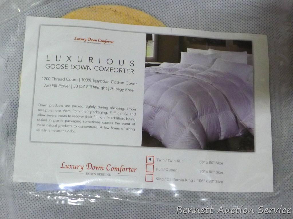 Twin size goose down comforter in good condition.