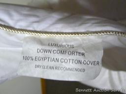 Twin size goose down comforter in good condition.