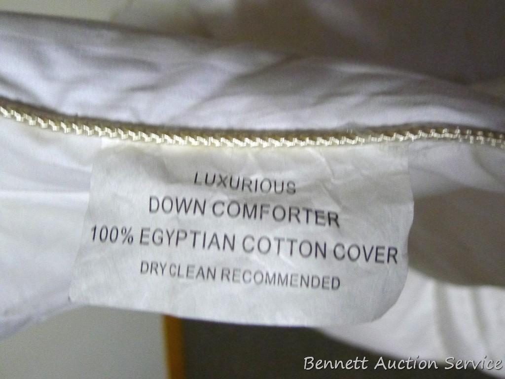 Twin size goose down comforter in good condition.