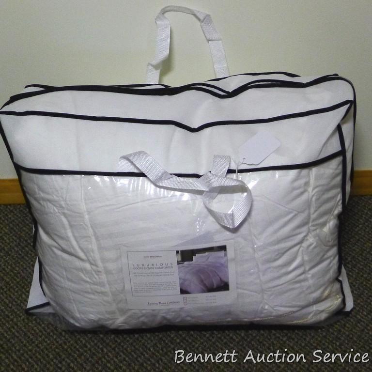 Twin size goose down comforter in good condition.