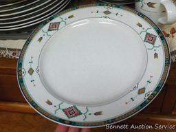 Set of dishes for 8 includes 12" platter, 11" plates, 6-1/2" saucers, 3-3/4" mugs, 3" cups, 8"
