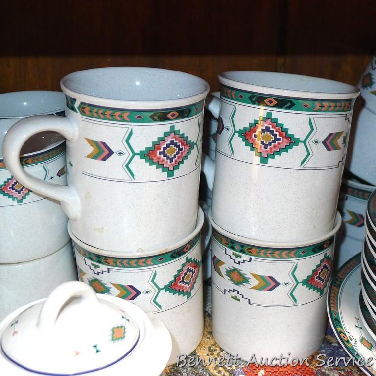 Set of dishes for 8 includes 12" platter, 11" plates, 6-1/2" saucers, 3-3/4" mugs, 3" cups, 8"