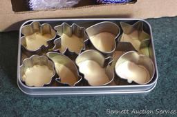 Pampered Chef miniature cookie cutters in metal box 3-1/2" x 6"; lots of decorative baking cups;