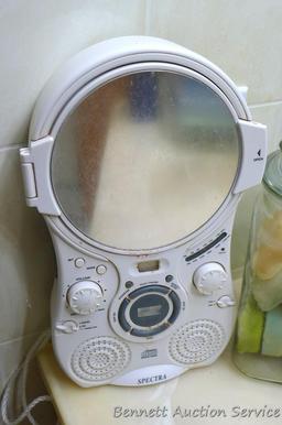 Set of three canisters, one filled with bars of soap, plus a Spectra radio/compact disc player. Disc