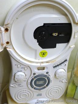 Set of three canisters, one filled with bars of soap, plus a Spectra radio/compact disc player. Disc