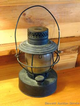 Handlan No 2000 lantern is marked C-O Co St Louis U.S.A. Has been turned in to a candle holder as