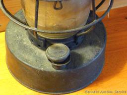 Handlan No 2000 lantern is marked C-O Co St Louis U.S.A. Has been turned in to a candle holder as