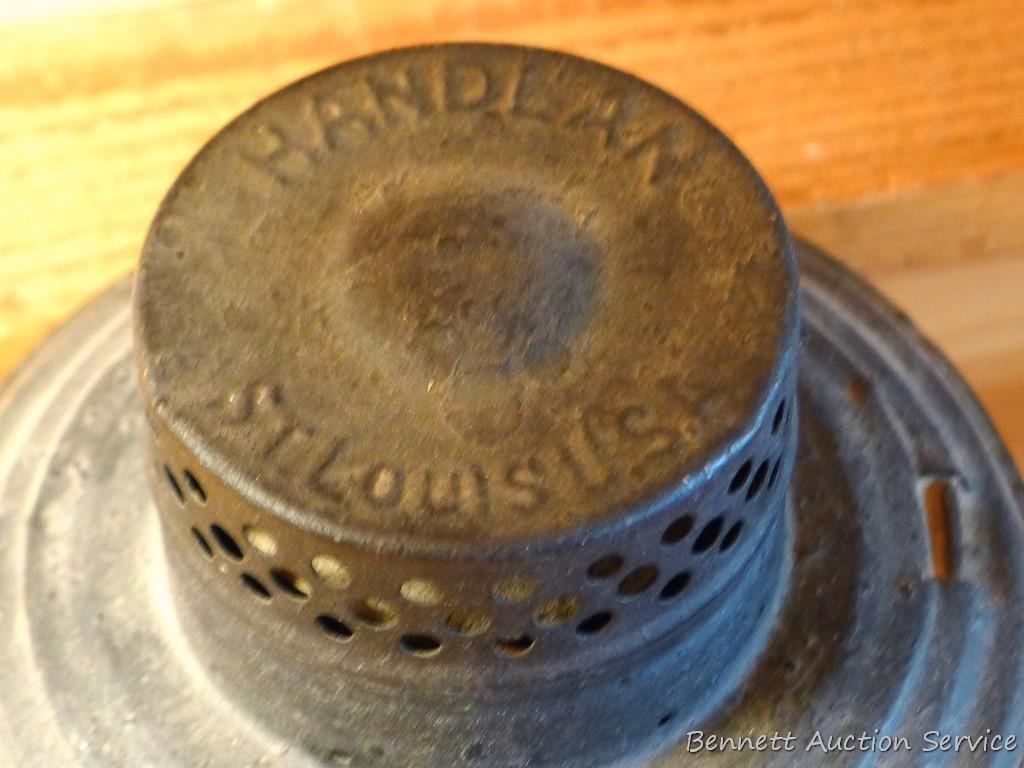 Handlan No 2000 lantern is marked C-O Co St Louis U.S.A. Has been turned in to a candle holder as