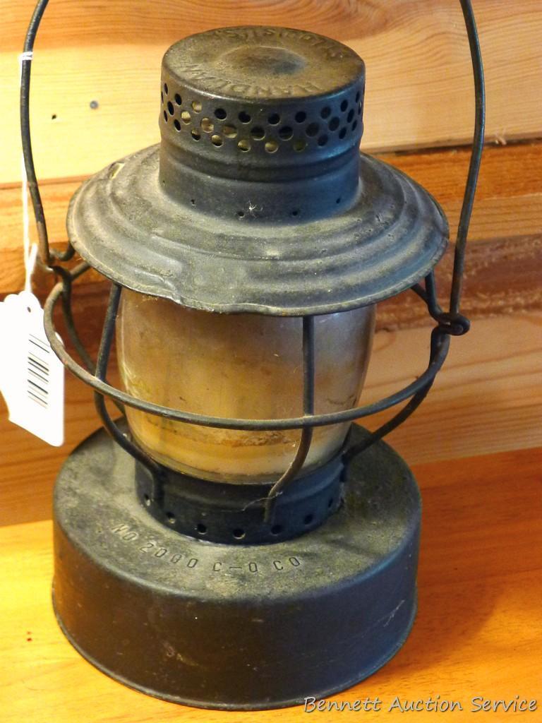 Handlan No 2000 lantern is marked C-O Co St Louis U.S.A. Has been turned in to a candle holder as