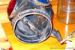 Adlake four-way railroad lantern is marked "The Adlake Non-Sweating Lamp Chicago". Two blue lenses