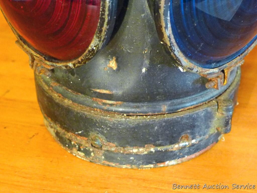 Adlake four-way railroad lantern is marked "The Adlake Non-Sweating Lamp Chicago". Two blue lenses