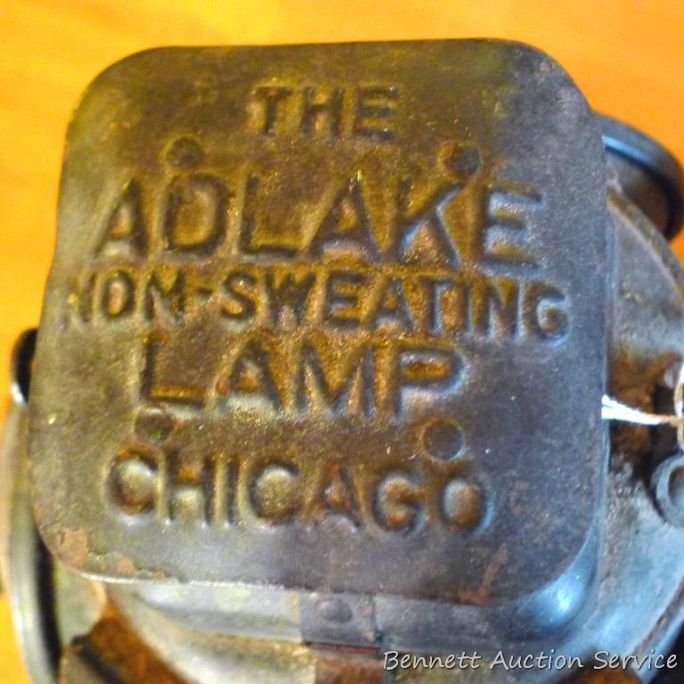 Adlake four-way railroad lantern is marked "The Adlake Non-Sweating Lamp Chicago". Two blue lenses