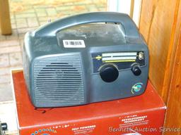 Freeplay Freepower solar power/ crank radio, radio came in when cranked and turned on. About 8"