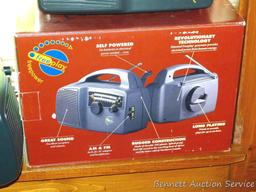 Freeplay Freepower solar power/ crank radio, radio came in when cranked and turned on. About 8"