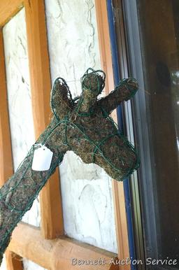 Handcrafted giraffe topiary form has a rebar base, stands 52" tall.