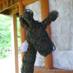 Handcrafted giraffe topiary form has a rebar base, stands 52" tall.
