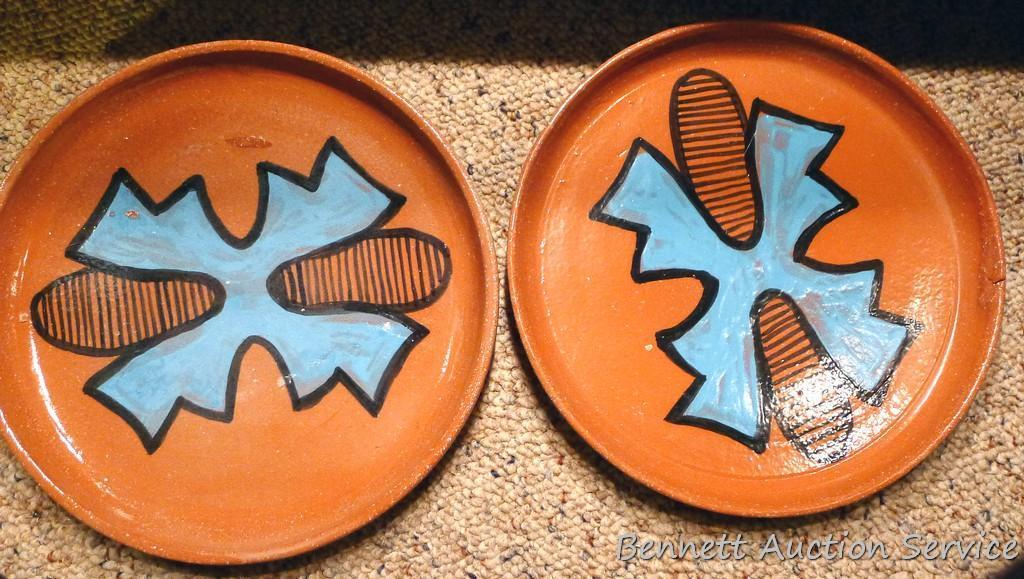 Twelve pcs. of Southwestern style dinnerware by Irene Gimeno. One piece has a repair on it, but all
