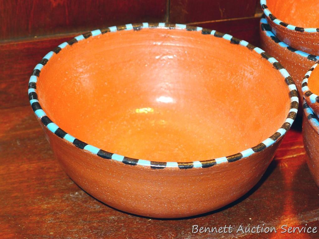 Twelve pcs. of Southwestern style dinnerware by Irene Gimeno. One piece has a repair on it, but all