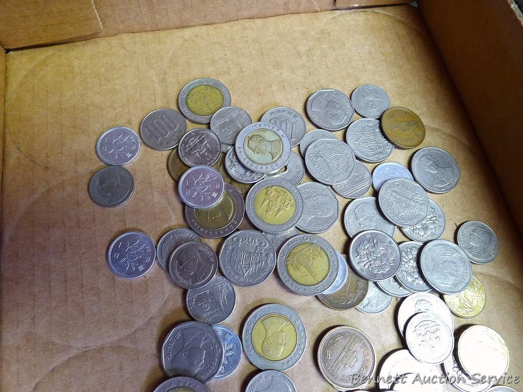 Foreign coins and currency as pictured.
