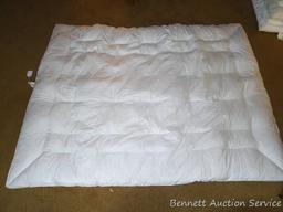 Pillowtex goose feather comforter is 60" x 80" in like new condition.